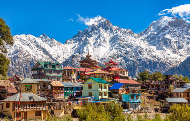 Scenic Himachal village at Kalpa with majestic Kinnaur Kailash Himalaya mountain range at Himachal Pradesh India